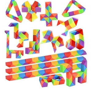 May include: A collection of colorful, geometric puzzle toys in various shapes, including triangles, crosses, and animals. The toys are made of small, connected blocks in a rainbow of colors, including red, orange, yellow, green, blue, and purple.