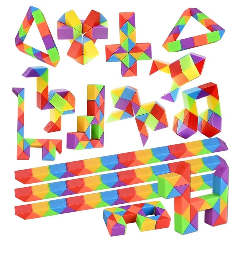 May include: A collection of colorful, geometric puzzle toys in various shapes, including triangles, crosses, and animals. The toys are made of small, connected blocks in a rainbow of colors, including red, orange, yellow, green, blue, and purple.