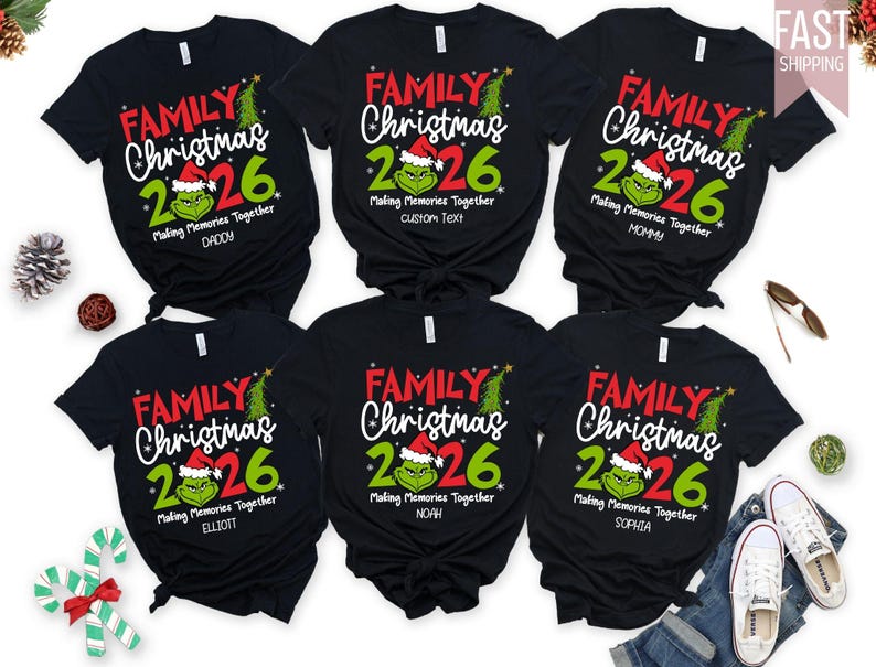May include: Six black short-sleeved t-shirts featuring a graphic with the text FAMILY Christmas 2026, a green character wearing a Santa hat, and the phrase Making Memories Together. Each shirt includes a unique name or custom text label below.