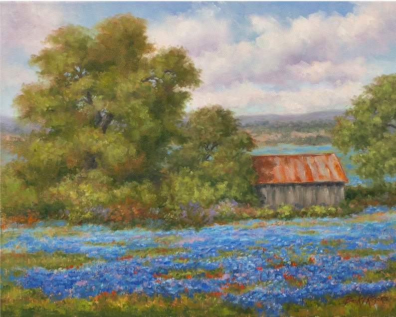 May include: A painting of a rustic wooden barn with a rusty metal roof, surrounded by a field of blue wildflowers. The barn is situated in a rural landscape with a distant view of a lake and trees.