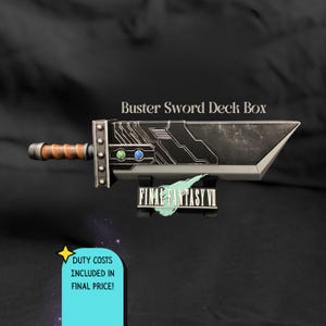 May include: A Buster Sword Deck Box, a Final Fantasy VII collectible. The sword features a black blade with silver accents, a brown handle, and green and blue details. The text "Buster Sword Deck Box" is above the sword.