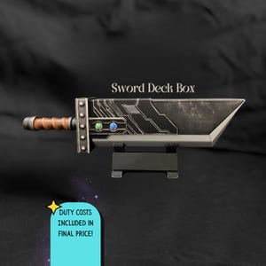 May include: A sword deck box featuring a brown handle, a silver crossguard with rivets, and a black blade with metallic circuit-like patterns. The blade includes one green and one blue circular inlay. The text Sword Deck Box is visible.