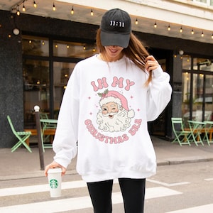 In My Christmas Era Sweatshirt, Festive Sweatshirt, Pink Retro Santa Face Shirt, Holiday Crewneck, Christmas PJs, Groovy Christmas Jammies