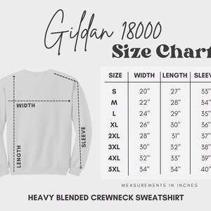 May include: Size chart for Gildan 18000 Heavy Blended Crewneck Sweatshirt. The chart shows measurements in inches for width, length, and sleeve length for sizes S through 5XL.