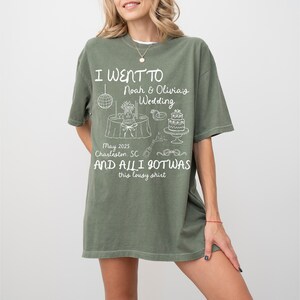 May include: A green t-shirt with white text that reads "I went to Noah & Olivia's Wedding May 2025 Charleston SC and all I got was this lousy shirt".