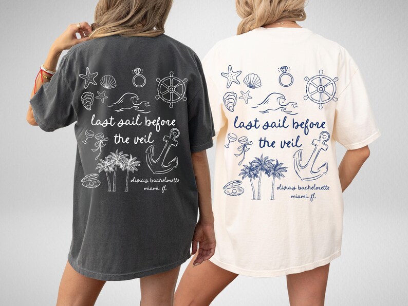 May include: Two white t-shirts with a nautical theme. The shirts have a graphic of an anchor, palm trees, seashells, a steering wheel, and the text "last sail before the veil". The text "Olivia's bachelorette Miami FL" is also on the shirts.