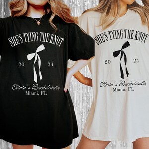 Shes Tying The Knot Bachelorette Shirts, Coquette Bow Bachelorette, Coquette Aesthetic Bridesmaids Gifts, Custom Location Bachelorette Shirt