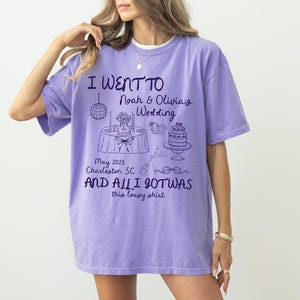 May include: Purple t-shirt with a graphic design that says "I went to Noah & Olivia's Wedding May 2025 Charleston, SC and all I got was this lousy shirt".