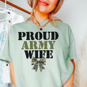 Custom Proud Army Wife Shirt, Personalized Army Solider Family Shirt, Proud Military Family Comfort Colors Green Camo Coquette Bow Army Mom