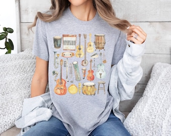 Camiseta de instrumentos musicales, regalo para amantes de la música, camisa de músico de acuarela, camiseta desgastada de artista musical vintage, cuello redondo unisex de instrumento