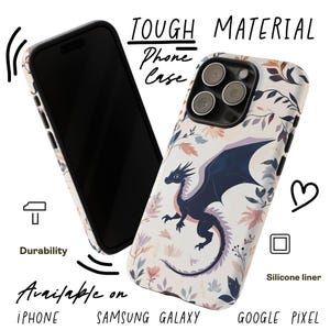 May include: A white phone case with a floral pattern and a black dragon illustration. The case is made of tough material and has a silicone liner. The text "TOUGH MATERIAL Phone Case" is written on the top of the image.