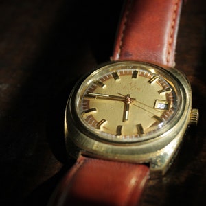 1970s Elgin with date window