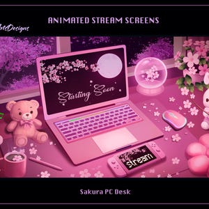 May include: Pink digital art of a Sakura PC desk setup. A laptop displays "Starting Soon" with a full moon. A teddy bear, bunny, and other accessories are on the desk. The text "Animated Stream Screens" and "Sakura PC Desk" are also visible.