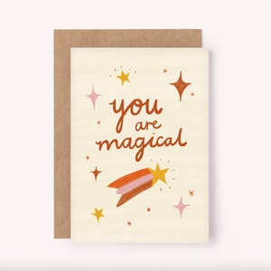 Tell someone how wonderful they are with this illustrated "You are Magical" sparkles and shooting stars greeting card