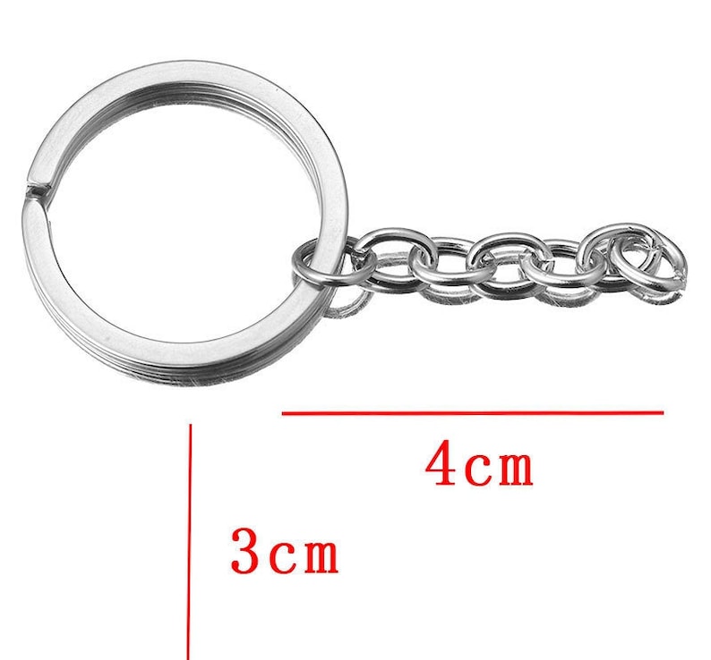 May include: Silver key chain with a 3 inch diameter ring and a 4 inch chain.