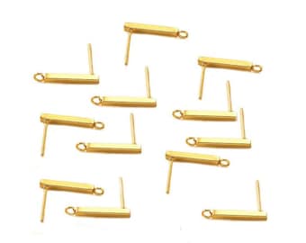 Può includere: Dieci perni per orecchini dorati con un piccolo anello all'estremità di ogni perno. I perni sono progettati per essere utilizzati con una varietà di ciondoli per orecchini.