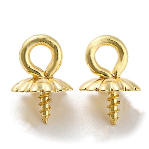 May include: Two gold-tone metal screw-on bead tips with a loop at the top. The tips have a decorative, scalloped base.
