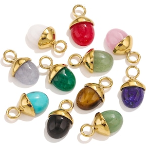 Puede incluir: Surtido de 10 abalorios de bellota de oro con cabujones de piedras preciosas de diferentes colores. Las piedras preciosas incluyen blanco, gris, rosa, rojo, verde, turquesa, ojo de tigre, negro y azul.