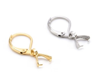 May include: Two earring hooks, one gold and one silver, with a spring-loaded clasp. The hooks are designed to hold charms or pendants.