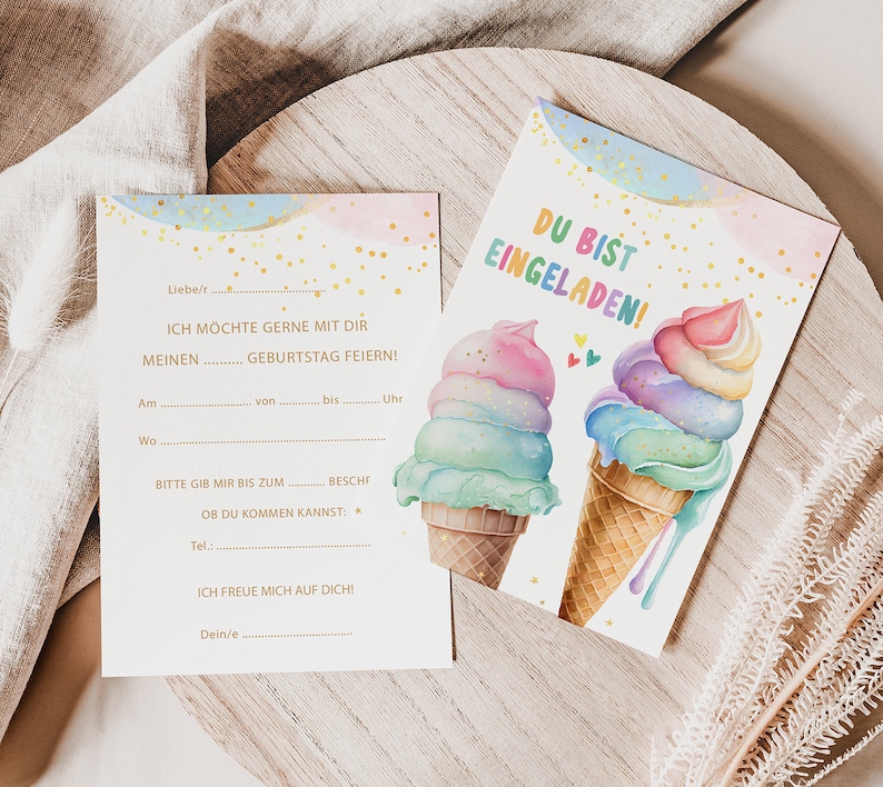 May include: Two invitation cards with watercolor illustrations of colorful ice cream cones. One card has fill-in-the-blank fields for party details. The other card says "YOU ARE INVITED!" in German. The cards have a pastel color scheme with gold confetti.
