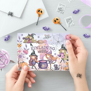 May include: A purple and white invitation card with a Halloween theme. The card features three witches with broomsticks, a cauldron, and the text "Einladung zu meinem Geburtstag".