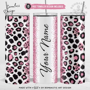 Könnte beinhalten: Drei Edelstahlbecher mit weißem Hintergrund. Die Becher haben einen rosa Glitzerrahmen und ein Leopardenmuster in Schwarz und Rosa. Ein Becher hat den Text "Your Name" in schwarzer Schrift.
