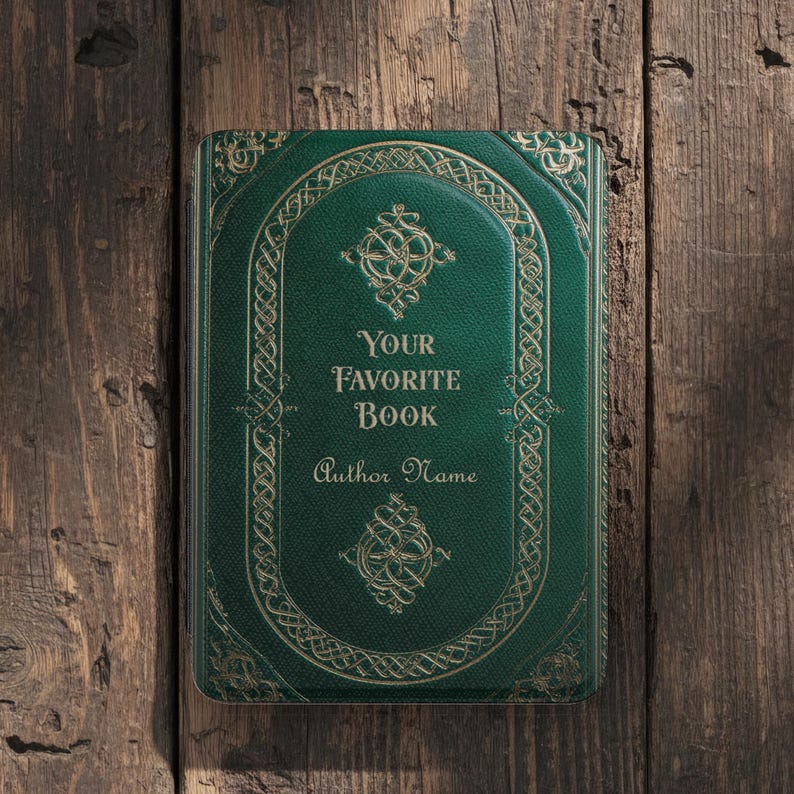 May include: A green book cover with gold filigree and the text "YOUR FAVORITE BOOK" and "Author Name". The cover has a textured appearance and is set against a wooden background.