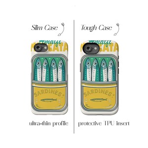 May include: Two phone cases with a sardine can design. The left case is a slim case, and the right case is a tough case. Both cases feature a yellow can with the word "SARDINES" and illustrations of sardines.