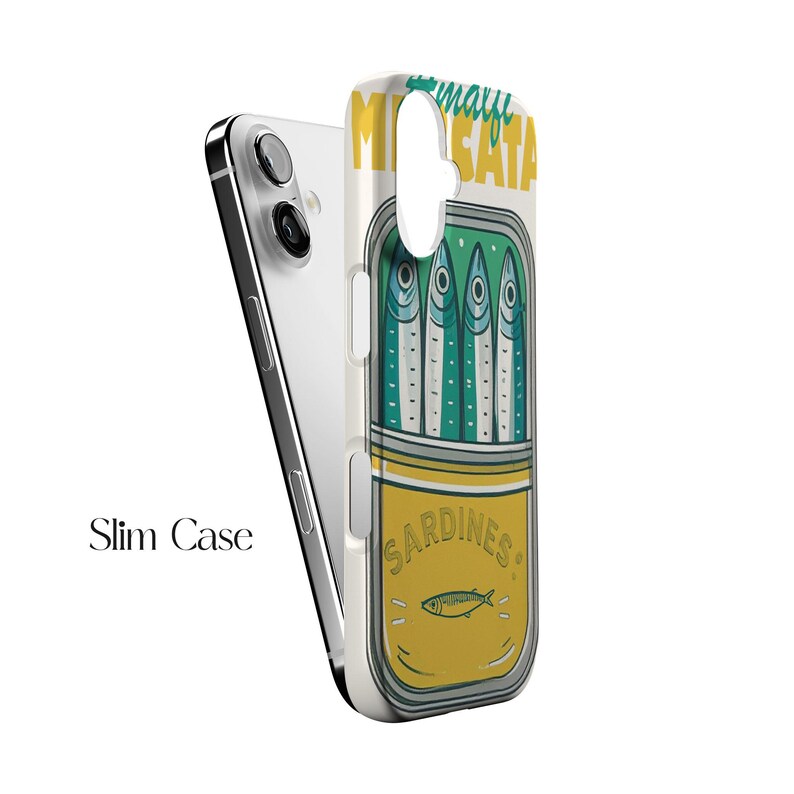 May include: A slim phone case featuring a sardine can design. The case has a yellow and white background with a green and blue sardine illustration. The text "Sardines" and "mayu SATA" are also visible on the case.