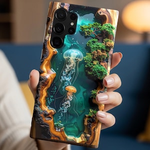 May include: A phone case featuring a detailed design of a deep-sea scene with jellyfish, a tree, and a wood-grain border. The case has a glossy finish and a multi-camera system.