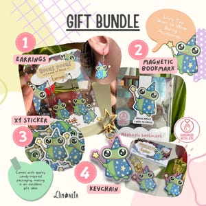 Könnte beinhalten: Geschenkset mit Accessoires zum Thema Frosch. Enthält Ohrringe, einen magnetischen Lesezeichen, einen Aufkleber und einen Schlüsselanhänger. Der Frosch trägt einen Zaubererhut und hält einen Zauberstab. Die Verpackung sagt "Hocus Pocus I need to focus."