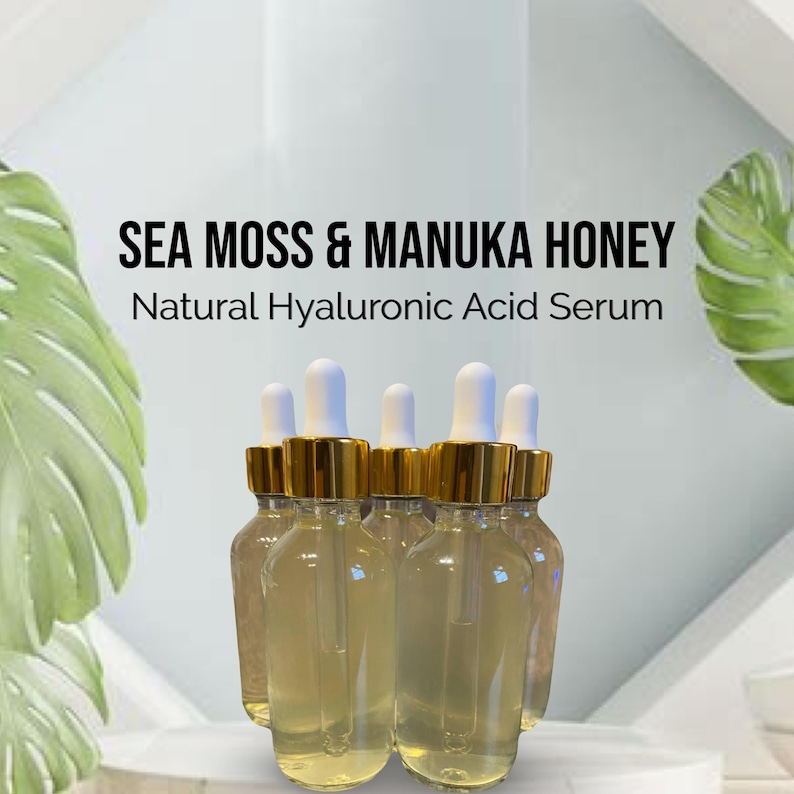 May include: Five clear glass bottles with gold lids and droppers filled with a light yellow liquid. The bottles are labeled "SEA MOSS & MANUKA HONEY Natural Hyaluronic Acid Serum".