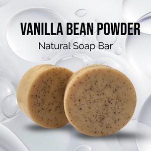 May include: Two round, light tan soap bars speckled with dark brown vanilla bean particles. The text VANILLA BEAN POWDER and Natural Soap Bar is printed above the soap bars against a white background with faint circular bubble patterns.