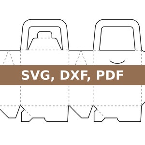 Puede incluir: Dibujo lineal de una caja de dos compartimentos con asa, dise&ntilde;ada para transportar objetos. La caja se muestra desplegada, con l&iacute;neas de puntos que indican d&oacute;nde doblar. El texto "SVG, DXF, PDF" est&aacute; impreso en una pancarta marr&oacute;n.