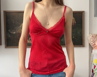 Sheer red lace camisole with pendant