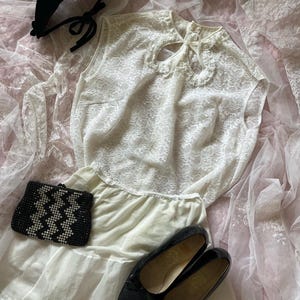 Vintage 1950s/1960s white nylon lace sheer sleeveles button back keyhole neckline blouse