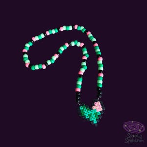 Zombie heart kandi necklace with a perler bead charm
