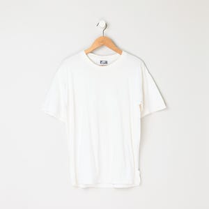 vintage 90s distressed nike gray tag white t-shirt - embroidered emblem - made in usa - men's M