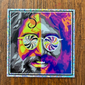 May include: A colorful psychedelic portrait of a man with swirling glasses. The image is split down the middle with the left side in shades of gray and the right side in shades of purple, blue, and orange.