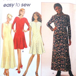 May include: Simplicity sewing pattern featuring four dress designs. The dresses include a long, sleeveless dress, a red long-sleeve dress, a polka-dot dress, and a floral print long-sleeve dress. The pattern is labeled "easy to sew".
