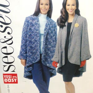 May include: A sewing pattern featuring two women modeling different jacket styles. One woman wears a blue patterned jacket with blue pants and the other wears a gray jacket with a black dress. The pattern includes sizes 10-24.