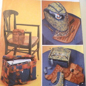 May include: A sewing pattern for crafting various storage items, including a chair-side organizer, a sewing machine bag, a boot-shaped needle case, and an iron caddy. The pattern includes instructions for making each item and is labeled with letters A through G.