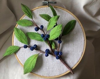 crepe paper blueberry branch in the embroidery frame