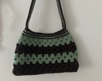 brown and green crochet purse