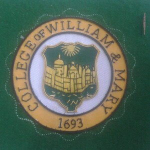 May include: A gold and green embroidered patch with the text "College of William & Mary" and the year "1693".