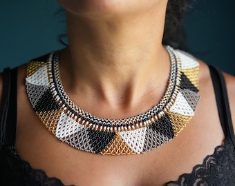 Unique necklace handmade by indigenous Embera women of Colombia