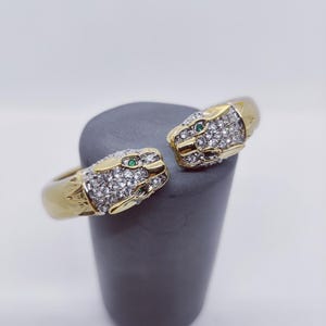Butler & Wilson golden Panther Head Hinged Bangle Bracelet, Crystal Embellished.