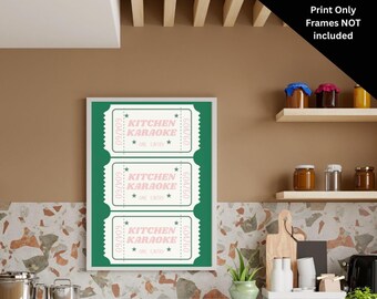 Puede incluir: Una impresión enmarcada con fondo verde y tres boletos rosas y blancos que dicen "Kitchen Karaoke" con el texto "One Entry" en cada boleto.
