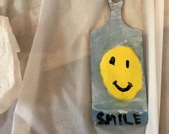 Smiley face cutting board