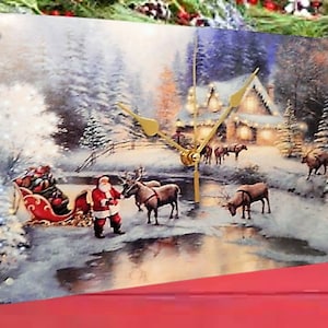 Reloj de pared eléctrico Bosque de invierno Escena de nieve Trineo de Papá Noel Reno 11,5 x 8 Cartel de chapa de metal Cuarzo Analógico Azul y blanco Decoración navideña para el hogar